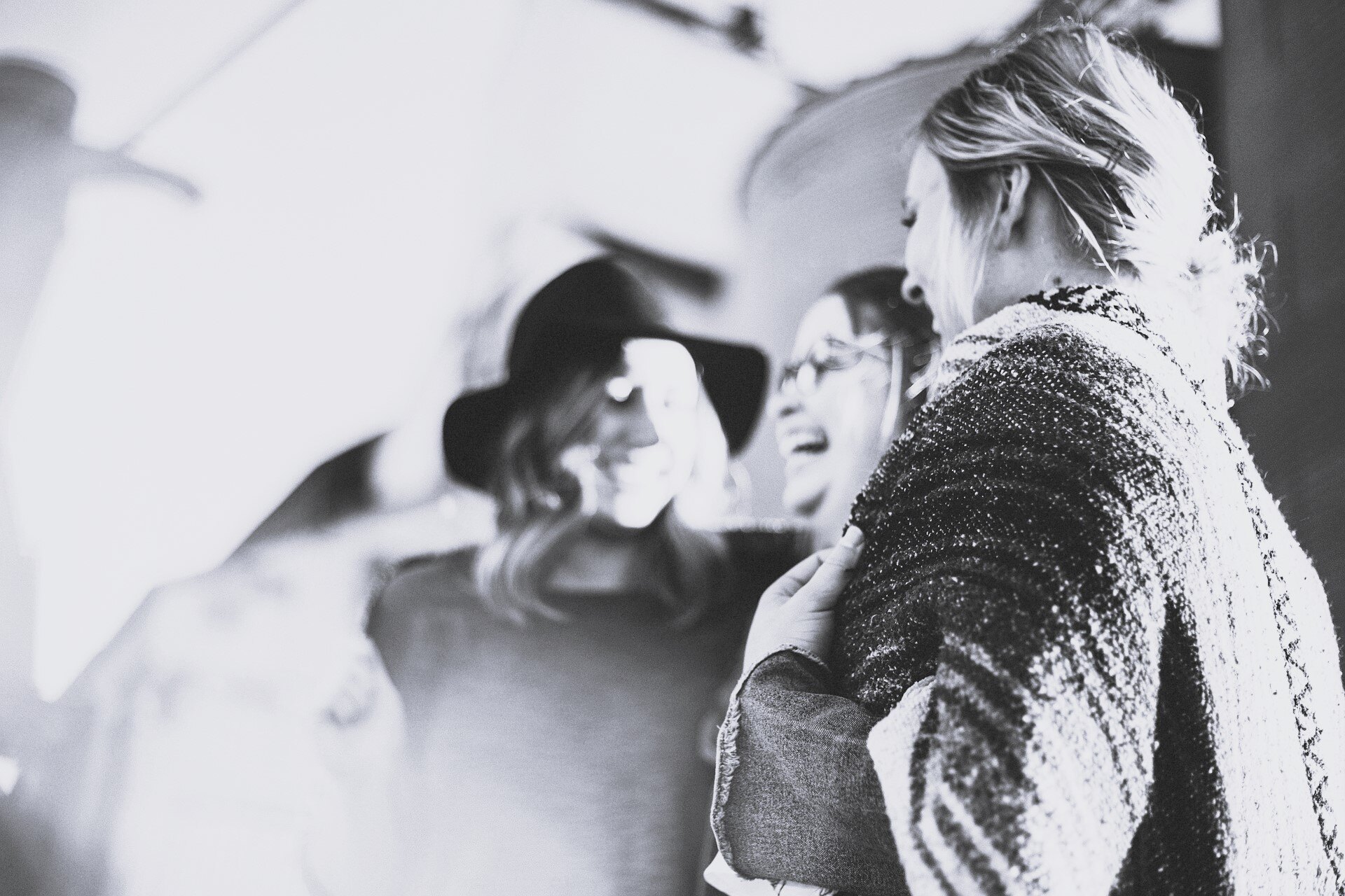 Older people laughing in a social setting